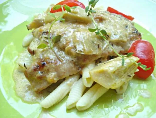 Vieiras ao molho cremoso com alcachofras